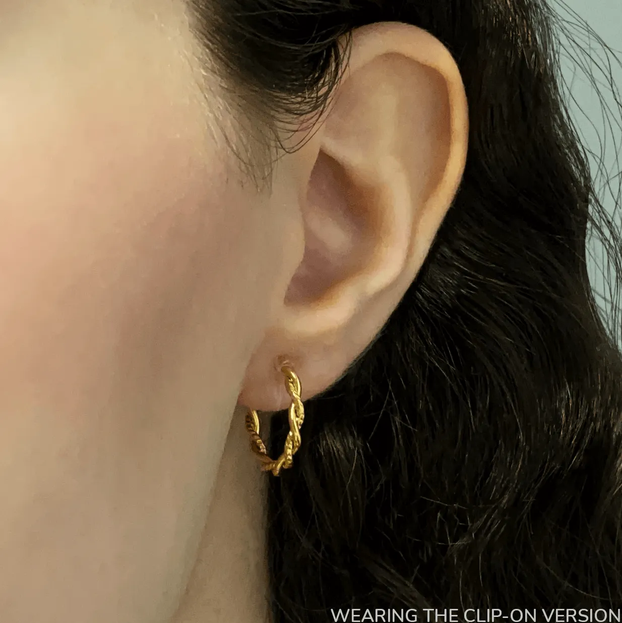 TWIST HUGGIE HOOP CLIP-ON EARRINGS